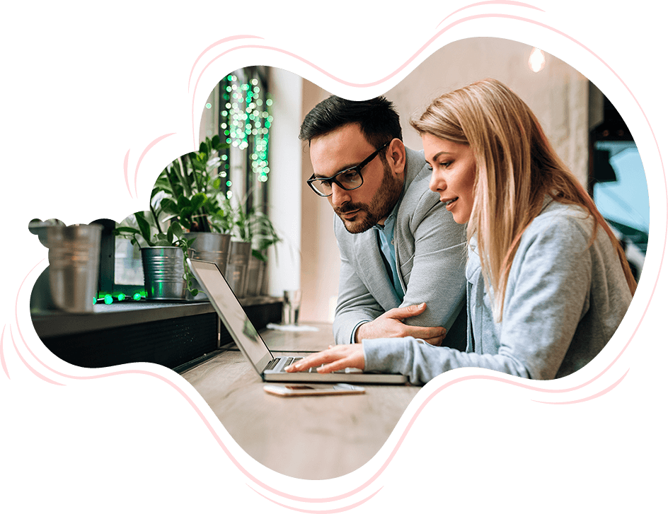 Professionals collaborating over eLearning on a laptop